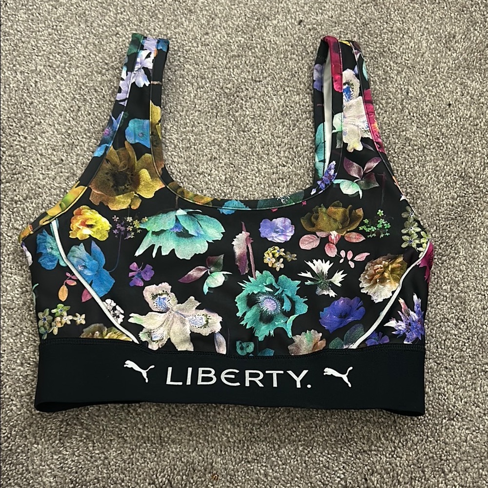 Puma Liberty Black Sports Bra with Vibrant Floral Design